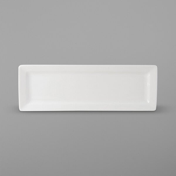 A rectangular white Tuxton AlumaTux china plate.