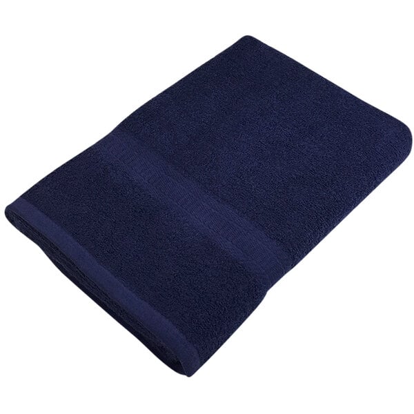 A navy blue Monarch Brands bath towel.
