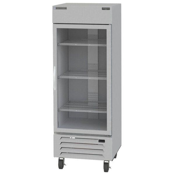 A white Beverage-Air reach-in freezer with shelves on wheels.