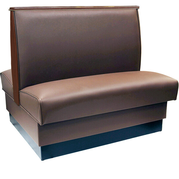 A brown leather booth seat with a wood top cap.