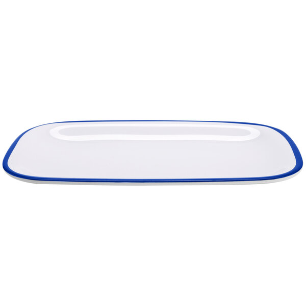A white rectangular melamine dinner platter with a blue border.