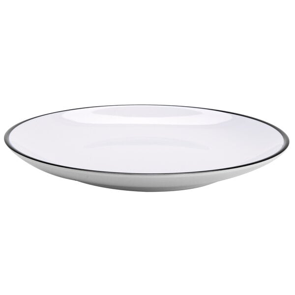 A white GET Settlement Bistro melamine dinner plate with a black rim.