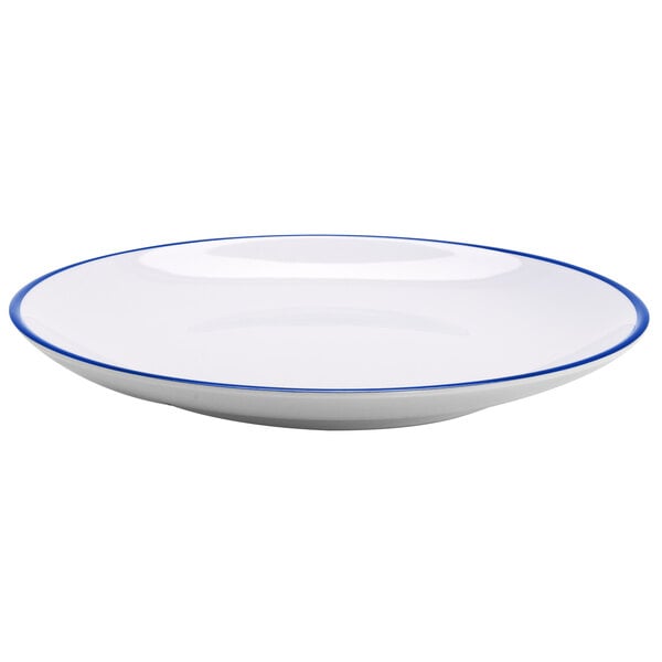 A white GET Settlement Bistro melamine dinner plate with a blue rim.