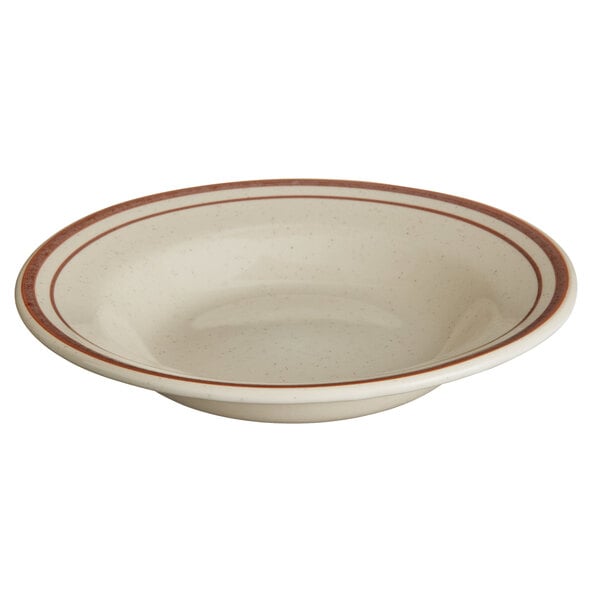 A white Libbey narrow rim stoneware soup bowl with brown bands and a red stripe.