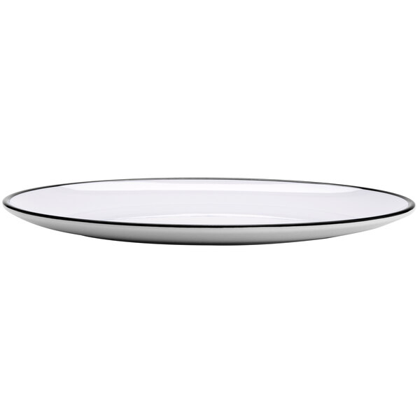 A white GET Settlement oval melamine dinner plate with a black rim.