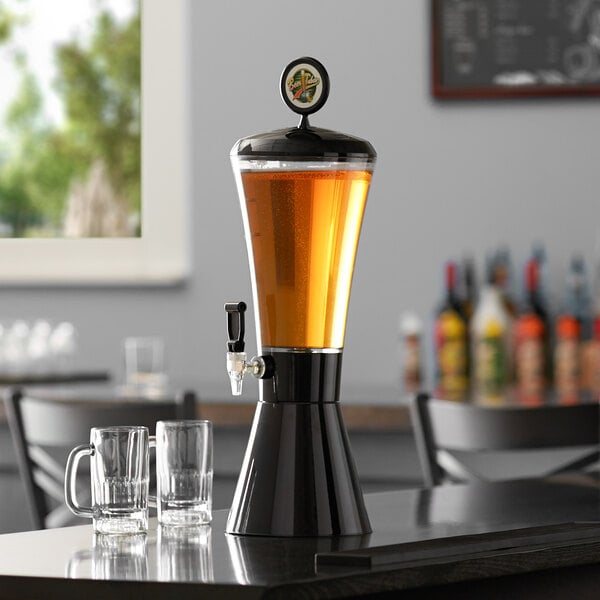 A close-up of a black and silver Beer Tubes beer tower on a table.