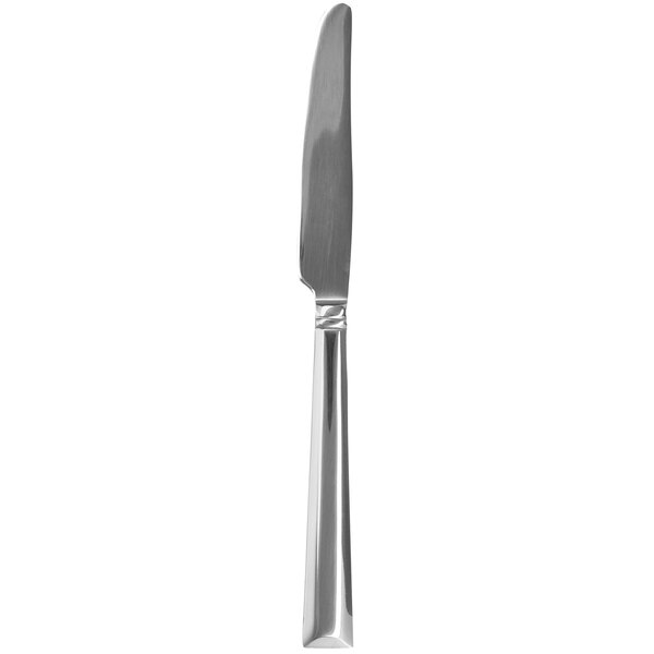 A Walco stainless steel European table knife with a silver handle and black blade.