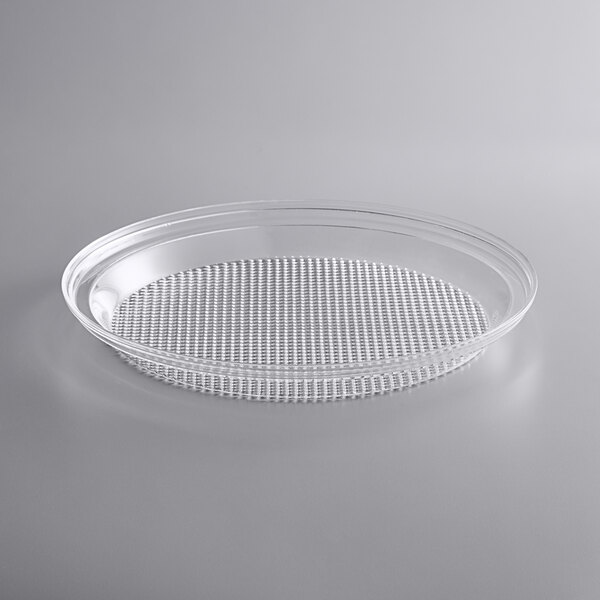 A clear plastic tray with a perforated surface.