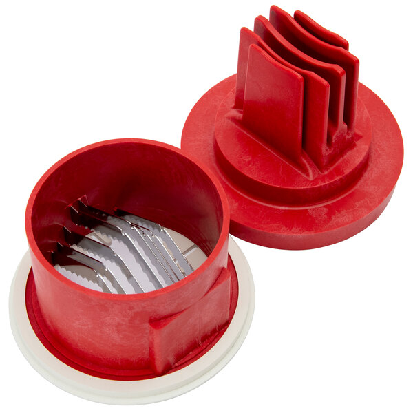 A red and white circular Sunkist tomato slicer set with seven blades inside.