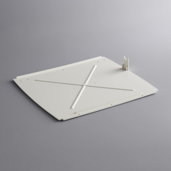 A white plastic board with a white cross on it.