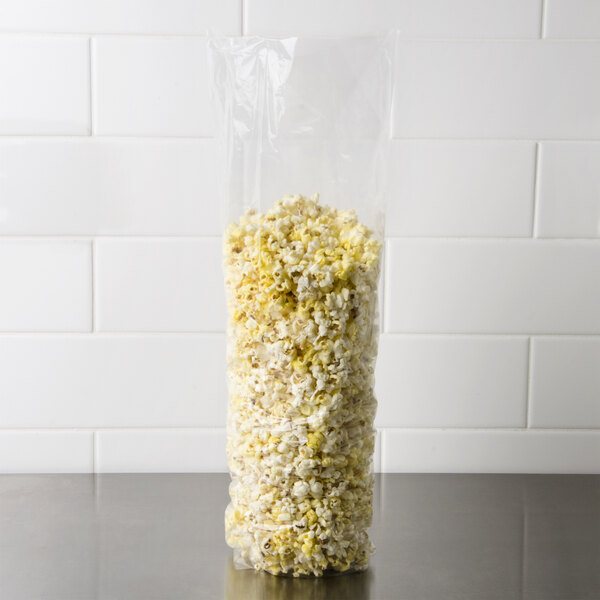 A LK Packaging plastic food bag of popcorn on a table.