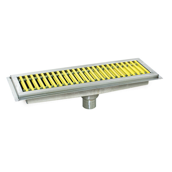 A metal floor trough with yellow fiberglass grating with white stripes.