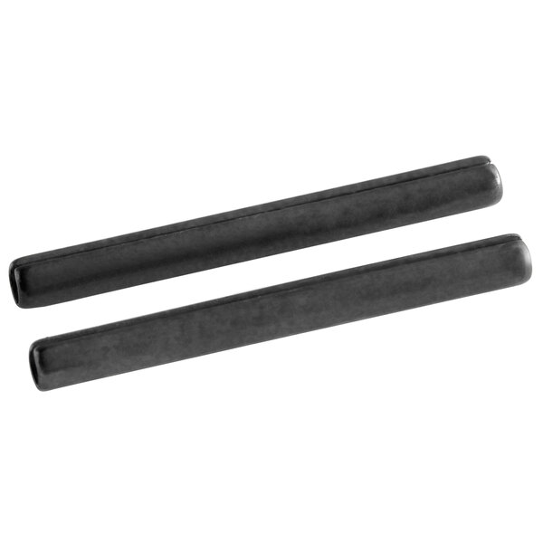 A pair of black metal rods with pointed ends.