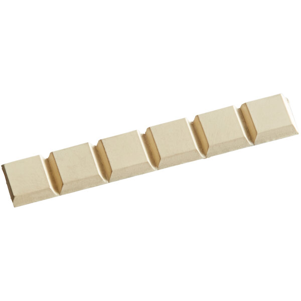 A white rectangular Sunkist foot pad set with rectangular shapes on it.