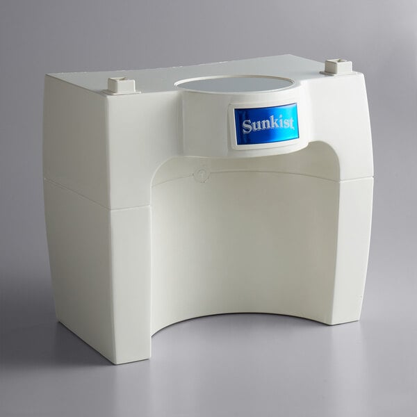 A white rectangular Sunkist production stand with a blue label.