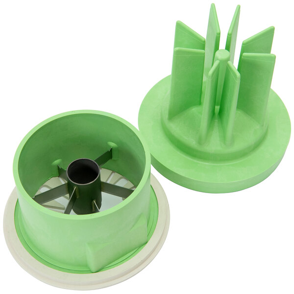A green plastic Sunkist blade set with metal parts.