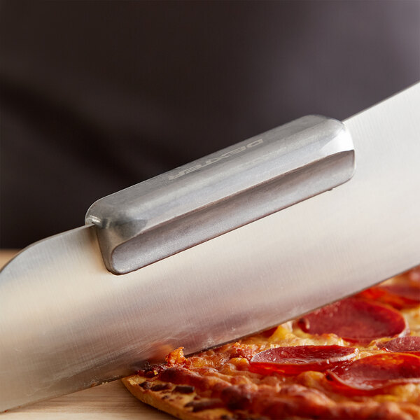 A Dexter-Russell pizza knife attachment slicing a pizza.