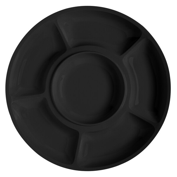 A close-up of a black GET Milano round plate with six compartments.