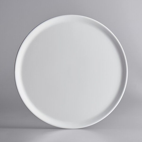 A GET Madison Avenue white melamine display plate with a round rim.