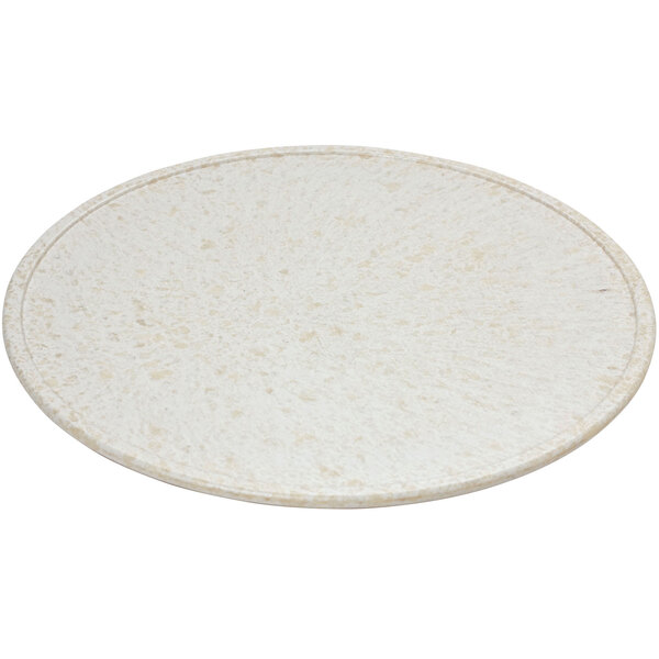 A white round melamine display board with a speckled surface.