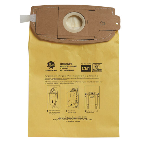 A yellow Hoover Allergen Filtration vacuum bag with a small hole in it.