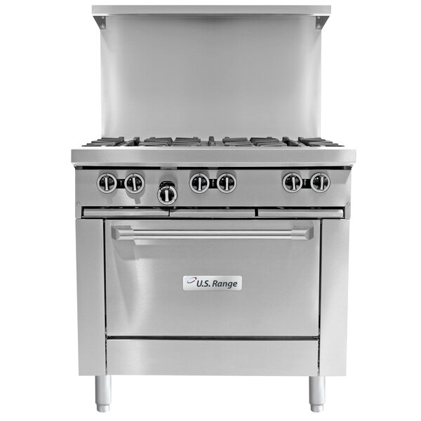 A stainless steel U.S. Range commercial gas range with a manual griddle over two ovens.