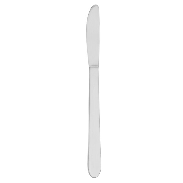 A Walco stainless steel dinner knife with a black handle and white rectangular object.