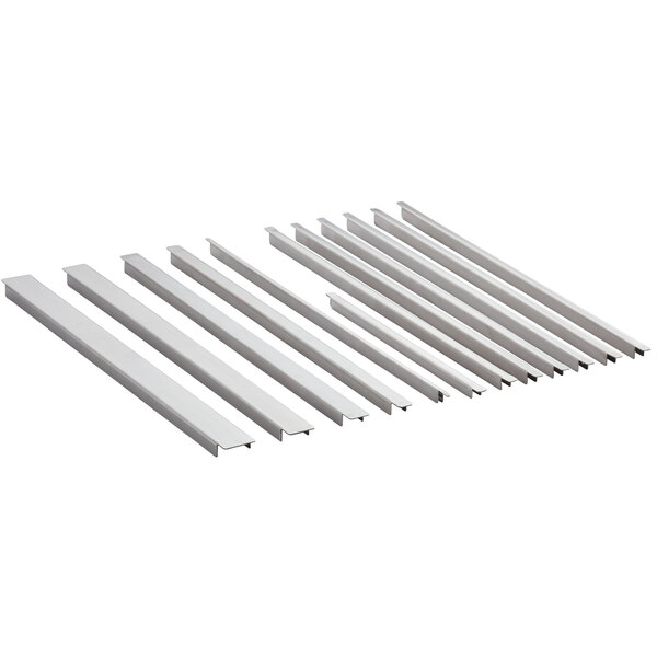 A close-up of several white metal bars.