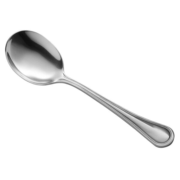 A Libbey McIntosh stainless steel soup spoon with a silver handle and bowl.