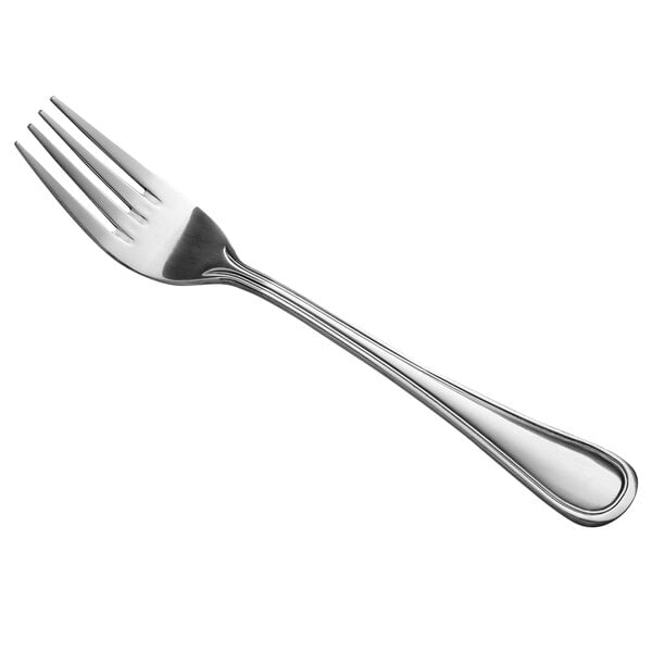 A close-up of a Libbey stainless steel dinner fork with a silver handle.
