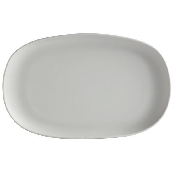 A light gray oval melamine plate with an irregular shape.