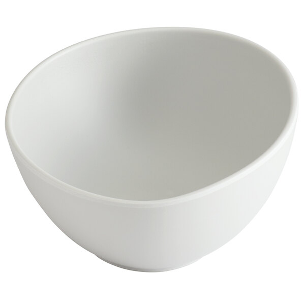 A light gray irregular round melamine bowl.