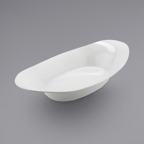 A white oval GET Enterprises melamine serving bowl with a curved edge.