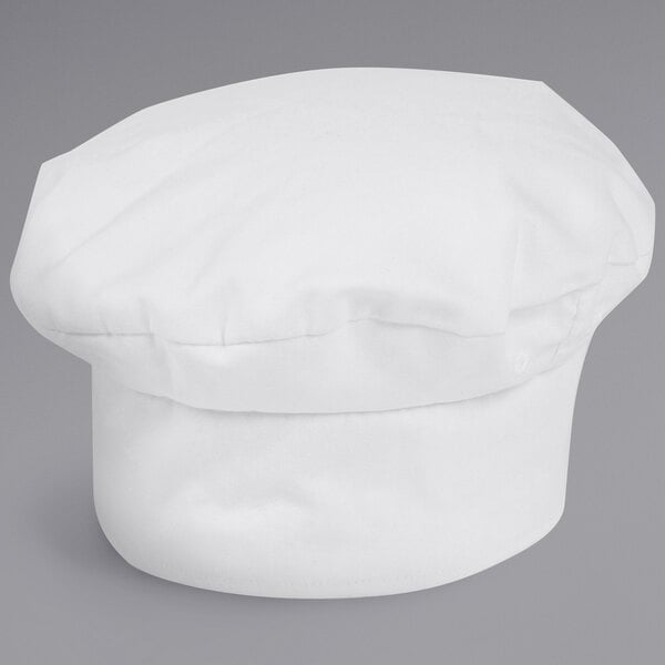 A close-up of a white Mercer Culinary chef beret.