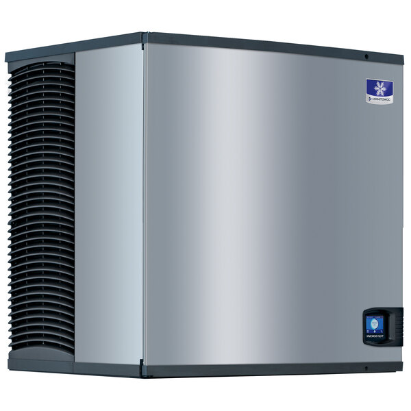 A silver rectangular Manitowoc air cooled ice machine with black and blue logos.
