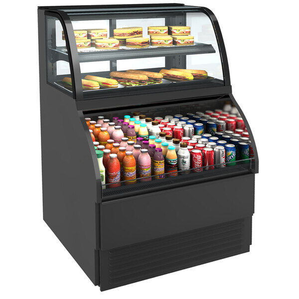 A black Structural Concepts refrigerated dual service merchandiser case with food and drinks on display.