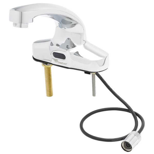 A T&S chrome deck mounted hands-free sensor faucet with a hose.