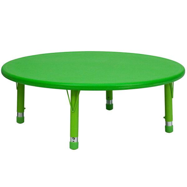 A Flash Furniture green plastic round table with legs.