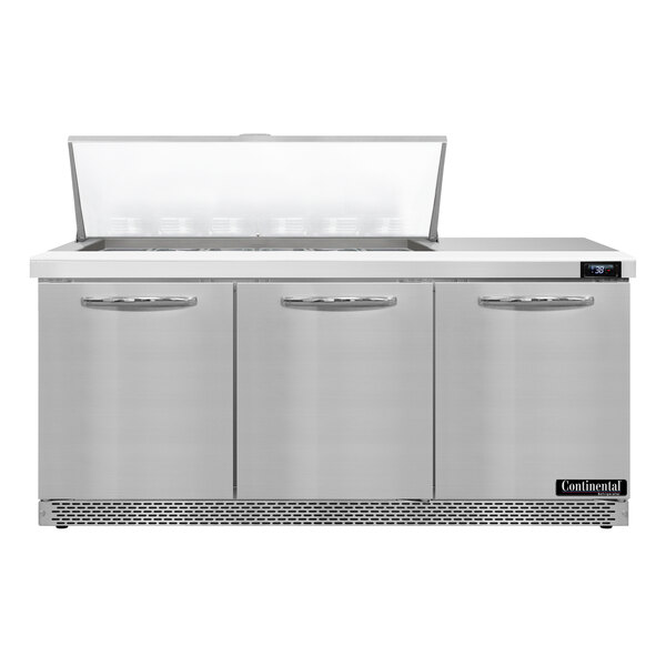 A stainless steel Continental Refrigerator with 3 doors and a lid open.