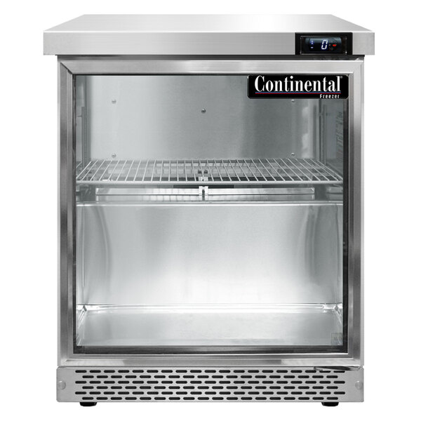 A Continental undercounter freezer with a glass door on a counter.