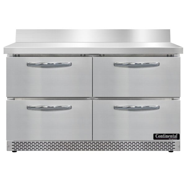 A stainless steel Continental worktop refrigerator with four drawers.
