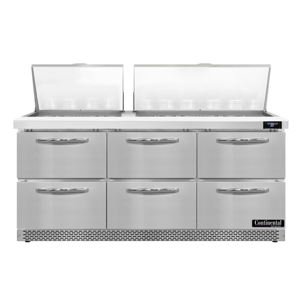 A stainless steel Continental Refrigerator with 6 drawers on a counter in a professional kitchen.