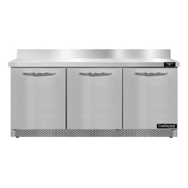 A stainless steel Continental Refrigerator worktop refrigerator with three doors.