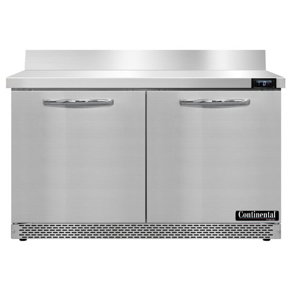 A stainless steel Continental worktop freezer with two doors.