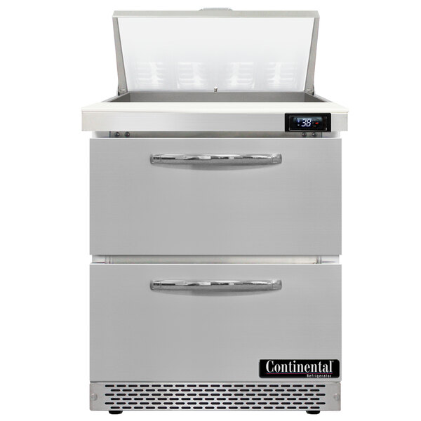A Continental Refrigerator stainless steel sandwich prep table with 2 drawers.