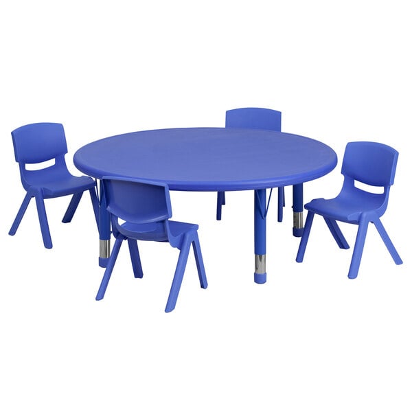 A blue plastic table with four blue chairs.