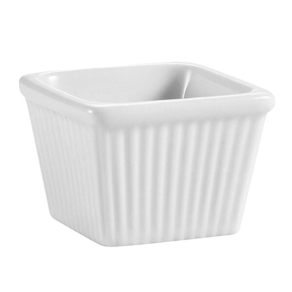 A white square fluted ramekin with a lid.