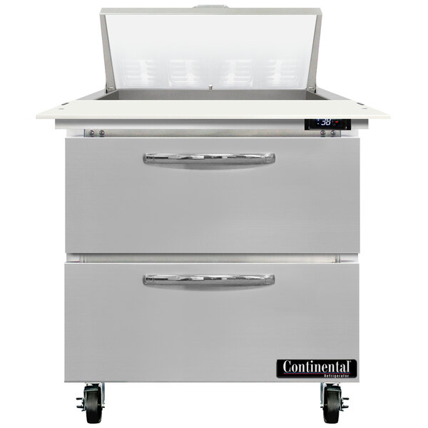 A stainless steel Continental Refrigerator with two drawers and a cutting top.