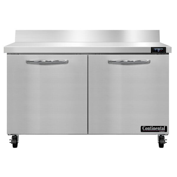 A Continental Refrigerator stainless steel worktop freezer with two doors.
