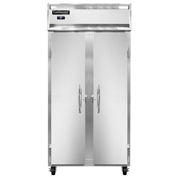 A large stainless steel Continental Refrigerator with two narrow doors.